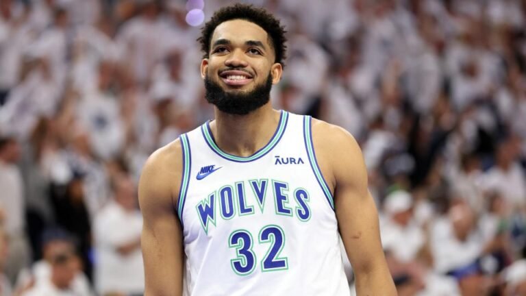 Minnesota Timberwolves center Karl-Anthony Towns (32) reacts in the first quarter against the Dallas Mavericks during game one of the Western Conference finals for the 2024 NBA playoffs at Target Center.