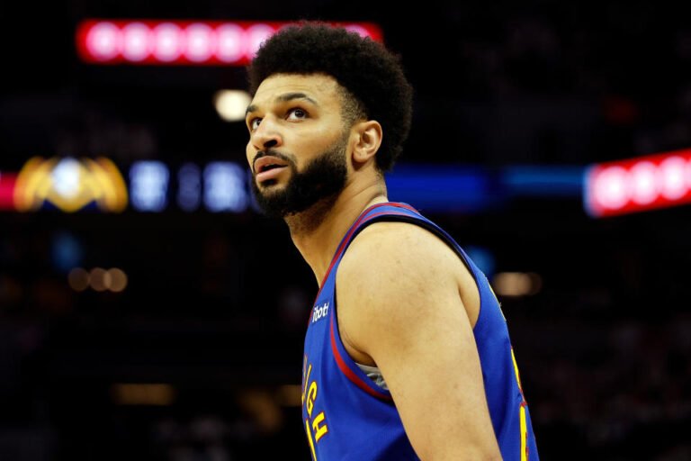 Jamal Murray #27 of the Denver Nuggets looks on against the Minnesota Timberwolves in the first quarter of Game Three of the Second Round of the Western Conference Finals at Target Center on May 10, 2024 in Minneapolis, Minnesota. The Nuggets defeated the Timberwolves 117-90. (Photo by David Berding/Getty Images)