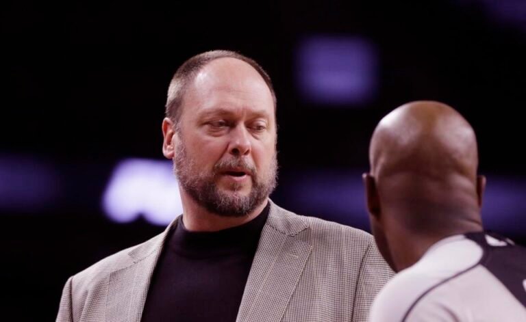 FILE - Brooklyn Nets assistant coach Joe Wolf talks with a referee during the second half of an NBA basketball game against the Detroit Pistons, Saturday, Jan. 9, 2016, in Auburn Hills, Mich. Joe Wolf, former North Carolina captain who went on. played for seven teams in an 11-year NBA career and later became a coach, died unexpectedly Thursday, the Milwaukee Bucks announced. (AP Photo/Carlos Osorio, File)