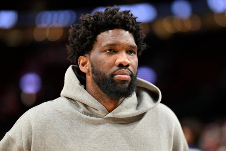 Joel Embiid will be in street clothes for Philadelphia's season opener against the Milwaukee Bucks. (Alika Jenner/Getty Images)