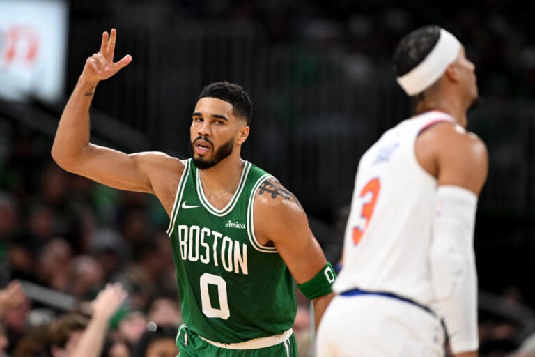 Jayson Tatum and the Celtics burned from 3 on opening night. (Brian Fluharty/Getty Images)