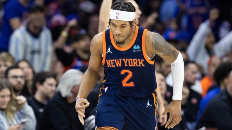 Apr 28, 2024; Philadelphia, Pennsylvania, USA; New York Knicks guard Miles McBride (2) reacts to his three-pointer against the Philadelphia 76ers during the first half of game four of the first round in the 2024 NBA playoffs at Wells Fargo Center. Mandatory Credit: Bill Streicher-Imagn Images