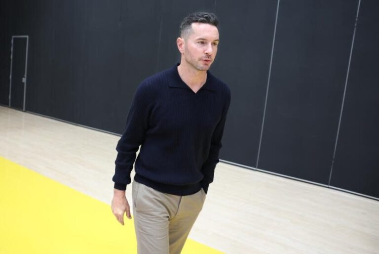 El Segundo, Calif., Sept. 25, 2024 Lakers head coach JJ Redick speaks with a reporter at the UCLA Health Training Center in El Segundo on Wednesday. (Wally Scali/Los Angeles Times)