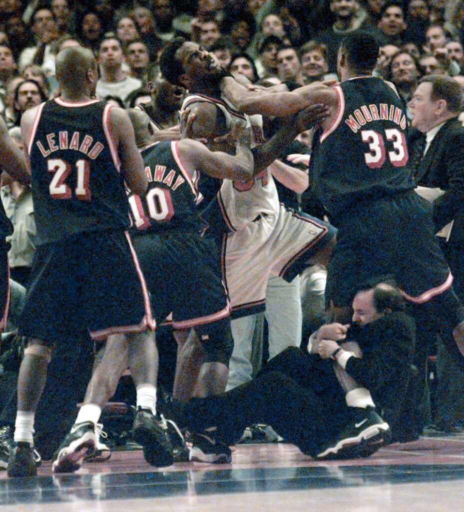 UNITED STATES - APRIL 30: New York Knicks vs. Miami Heat at MSG for Game4... Knicks Charles Oakley is pushed by Heats Alonzo Mourning while Jeff Van Gundy got a piece of Alonzo's leg trying to separate players. (Photo by Linda Cataffo/NY Daily News Archive via Getty Images)