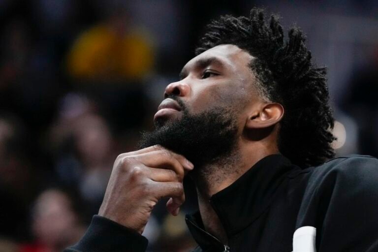 NBA fines 76ers $100,000 over comment about Joel Embiid's injury, team has no timetable for his or Paul George's return