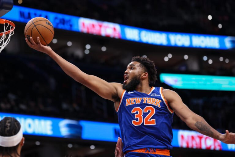 WASHINGTON, DC - OCTOBER 18: Karl-Anthony Towns #32 of the New York Knicks goes to the basket against the Washington Wizards during the second half of the preseason game at Capital One Arena on October 18, 2024 in Washington, DC . NOTE TO USER: User expressly acknowledges and agrees that, by downloading and or using this photo, User agrees to the terms and conditions of the Getty Images License Agreement. (Photo by Scott Taetsch/Getty Images)