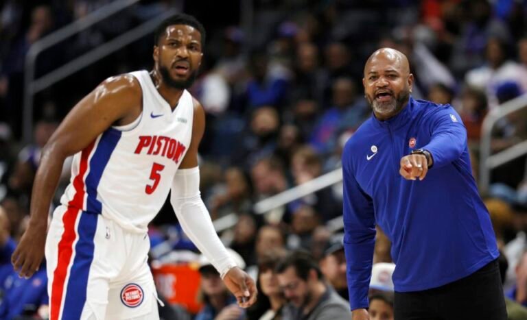 Detroit Pistons head coach JB Bickerstaff, right, directs guard Malik Beasley (5) during the first half of an NBA basketball game against the Indiana Pacers Wednesday, Oct. 23, 2024, in Detroit. (AP Photo/Duane Burleson)