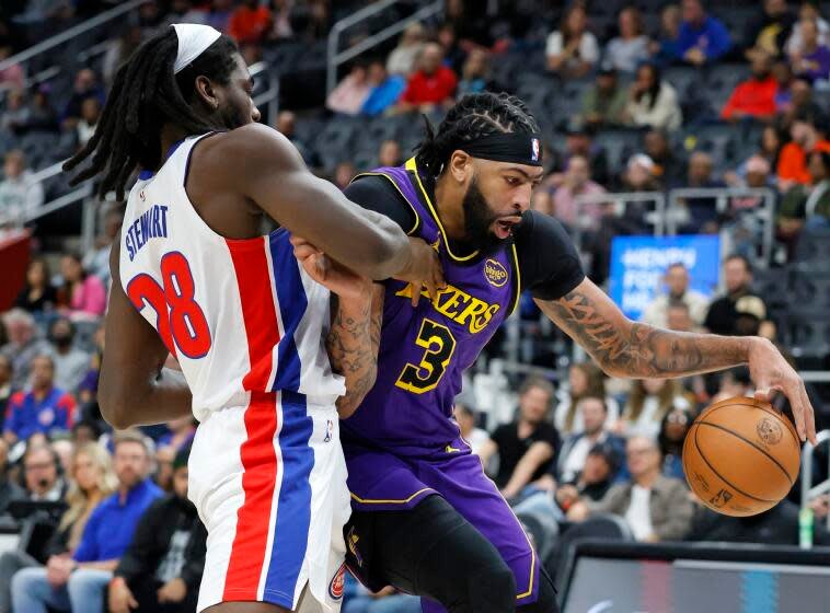 Detroit Pistons center Isaiah Stewart (28) guards Los Angeles Lakers forward Anthony Davis.