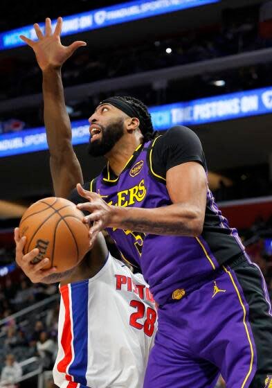 Los Angeles Lakers forward Anthony Davis (3) goes to the basket past Detroit Pistons.