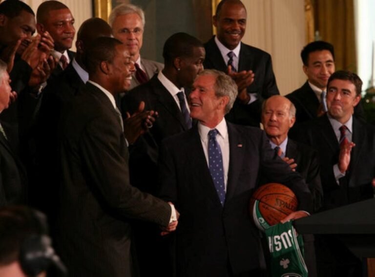 This Sept. 19, 2008 photo shows President George W. Bush and Boston Celtics captain Paul Pierce shake hands as the team visited the White House after their championship victory.