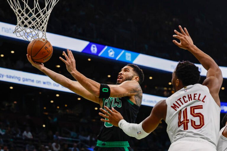 BOSTON, MASSACHUSETTS - NOVEMBER 19: Jayson Tatum #0 of the Boston Celtics shoots against Donovan Mitchell #45 of the Cleveland Cavaliers during the first quarter of the Emirates NBA Cup at TD Garden on November 19, 2024 in Boston, Massachusetts. NOTE TO USER: User expressly acknowledges and agrees that, by downloading and or using this photo, User agrees to the terms and conditions of the Getty Images License Agreement. (Photo by Winslow Townson/Getty Images)