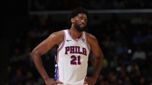 Joel Embiid 'managing swelling in his left knee,' missed Friday, will be out Sunday