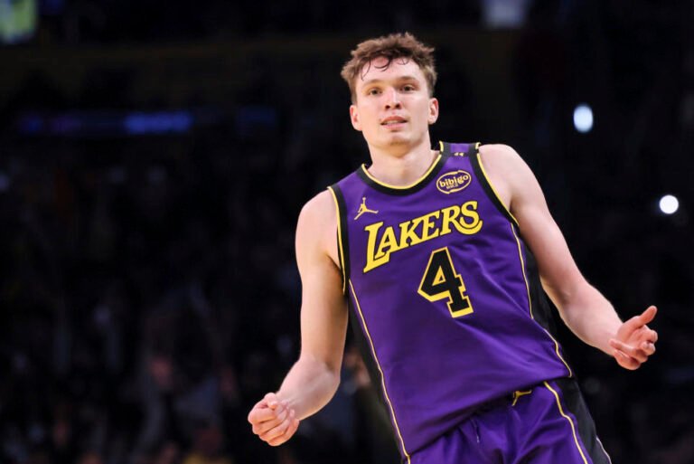 Los Angeles Lakers guard Dalton Knecht celebrates after hitting a 3-pointer during the second half of an Emirates NBA Cup basketball game against the Utah Jazz, Tuesday, Nov. 19, 2024, in Los Angeles. (AP Photo/Etienne Laurent)