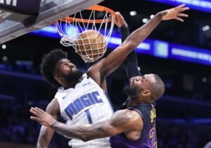 Lakers LeBron James hires over Magic's Jonathan Isaac.