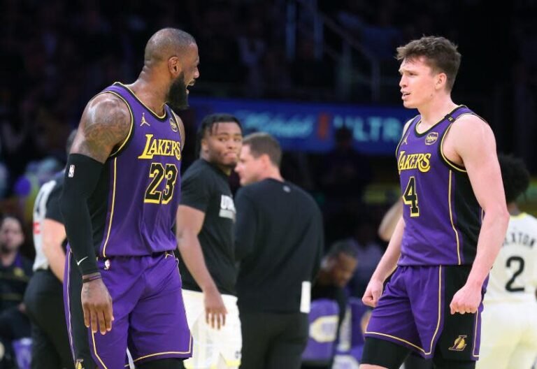 Los Angeles, Calif. Nov. 19, 2024 Lakers LeBron James, left, celebrates Dalton Knecht's three-pointer against the Jazz in the second half at Crypto.com Arena on Tuesday. (Wally Scali/Los Angeles Times)