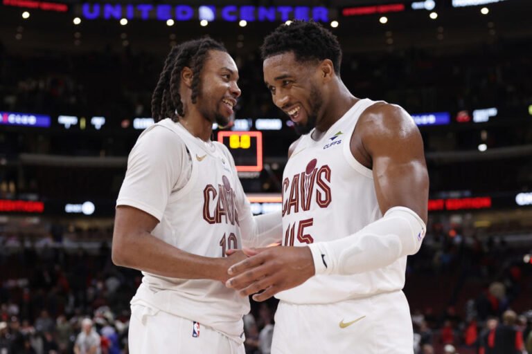 CHICAGO, ILLINOIS - NOVEMBER 11: Darius Garland (L) #10 of the Cleveland Cavaliers and Donovan Mitchell #45 of the Cleveland Cavaliers celebrate their win over the Chicago Bulls at the United Center on November 11, 2024 in Chicago , Illinois. NOTE TO USER: User expressly acknowledges and agrees that, by downloading and or using this photo, User agrees to the terms and conditions of the Getty Images License Agreement. (Photo by Geoff Stellfox/Getty Images)